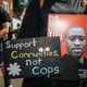 A person holds a sign of George Floyd during a demonstration on August 17, 2020 in Minneapolis, Minnesota.